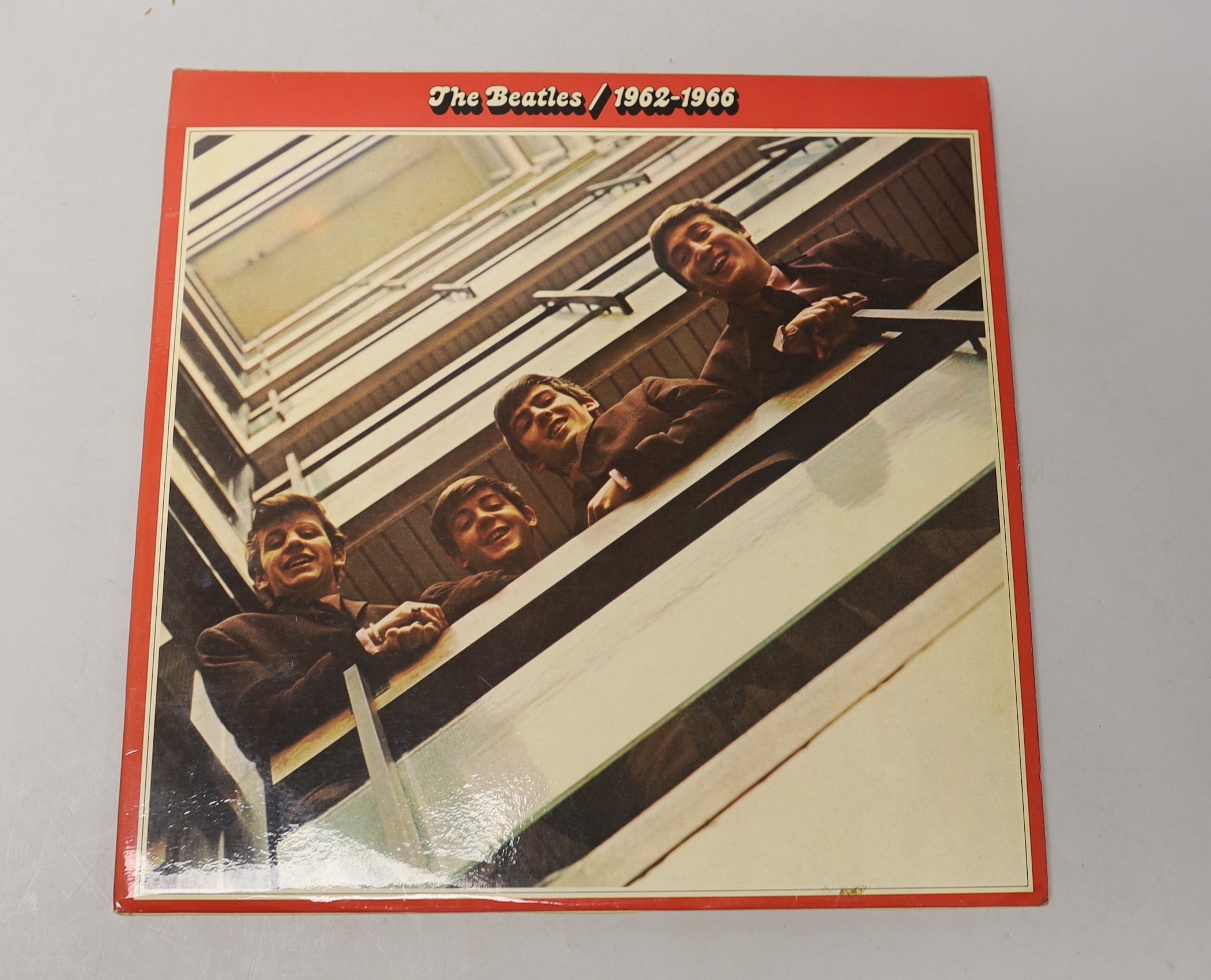 A collection of five Beatles LP’s to include top opening White Album